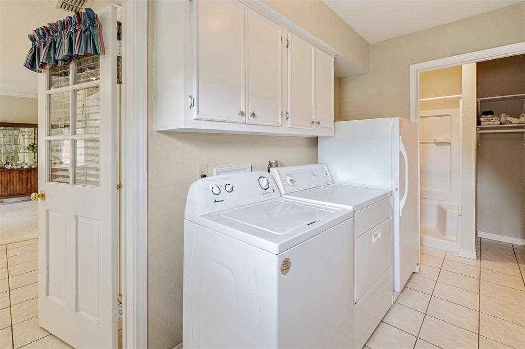 11608 State Highway 19 N, Athens, TX 75752 Laundry room with storage area and shower