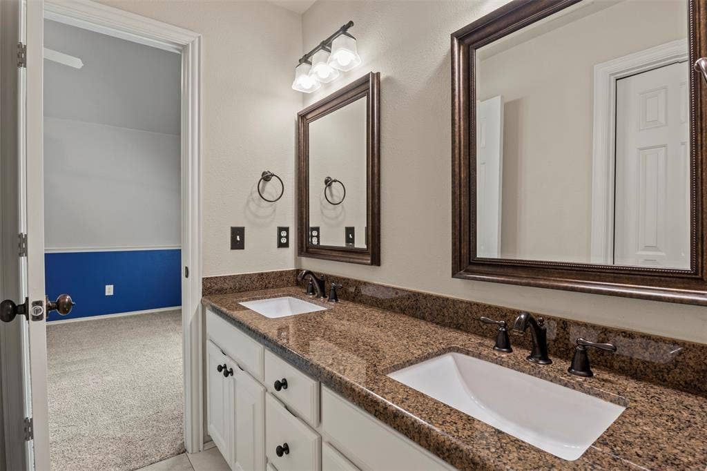 5812 Kingsbrook Drive, Plano, TX 75093 Double sinks and granite counter top.