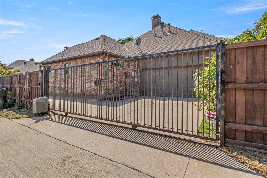 5812 Kingsbrook Drive, Plano, TX 75093 Gate allows for extra security.