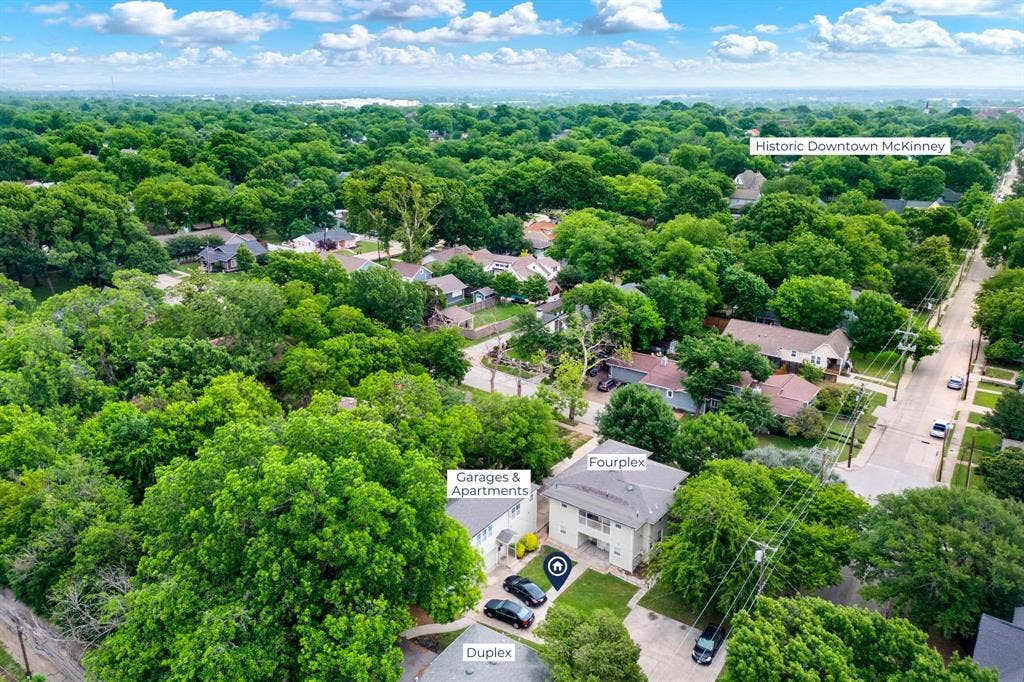 303 N Waddill A,B,C Street, McKinney, TX 75069 Aerial view of the full property, featuring three structures on one lot with extensive driveway and street parking to support multiple units.