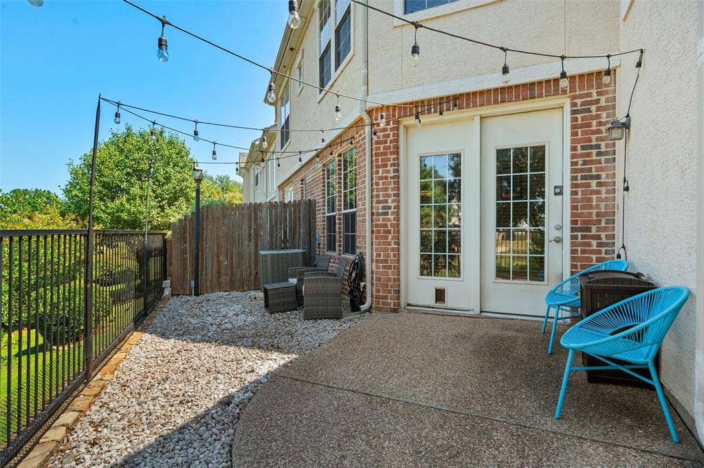 4424 Honfleur Court, Irving, TX 75038 The patio continues with a metal fence to allow your enjoyment of the water views--the neighborhood creek and lush landscape!