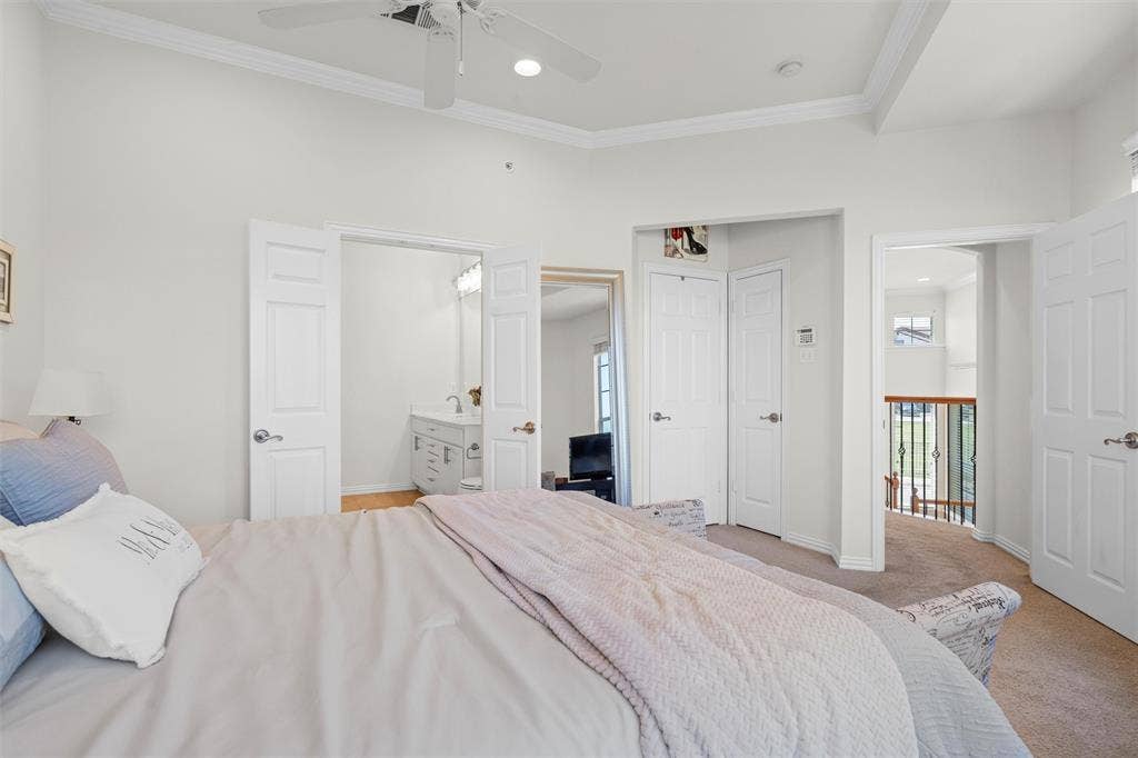 4424 Honfleur Court, Irving, TX 75038 Not only does the primary bedroom feature a large ensuite bath, but also has two closets!