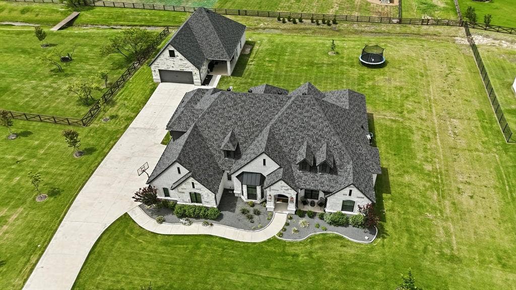 Custom-built residence featuring 2 homes on one acre