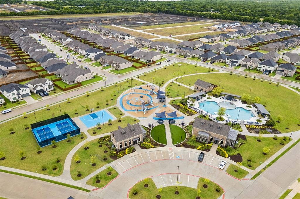 917 Breezy Street, Princeton, TX 75407 Community center with pickleball courts, basketball court, playground, community pool, and club house