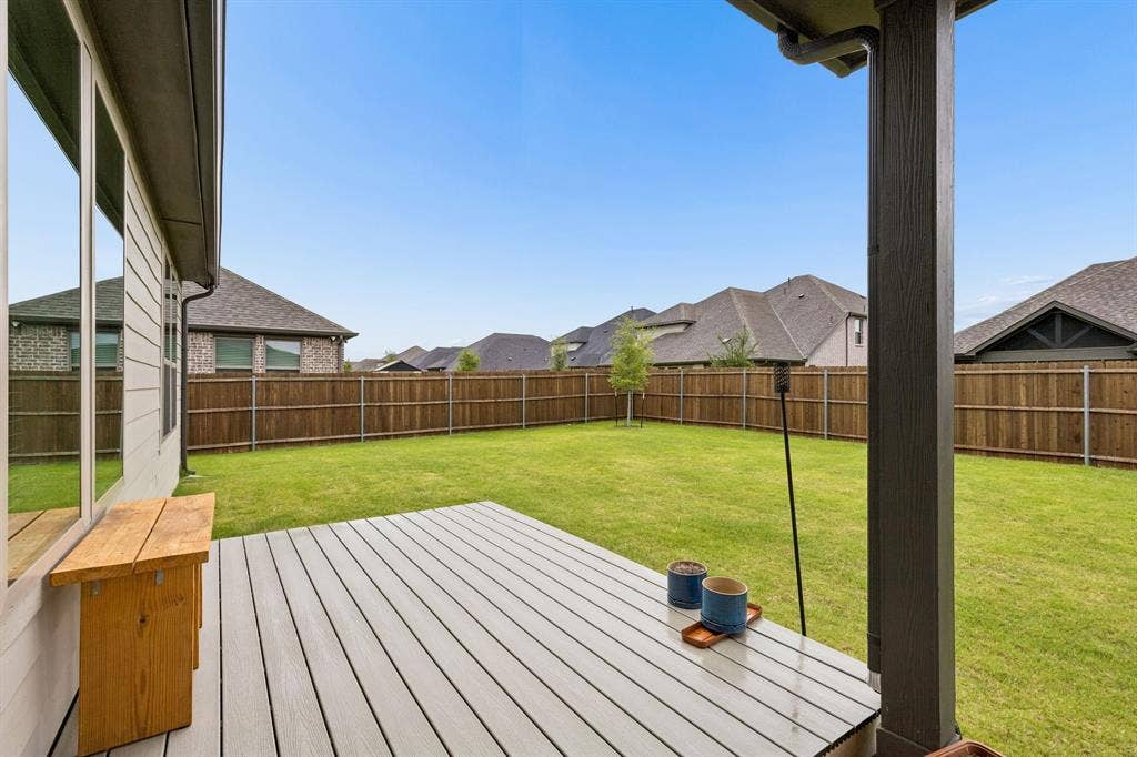 917 Breezy Street, Princeton, TX 75407 Large backyard with deck