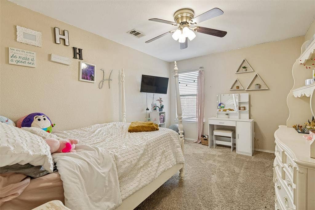 605 Rock Brook Drive, Forney, TX 75126 Carpeted interior space featuring neutral wall tones