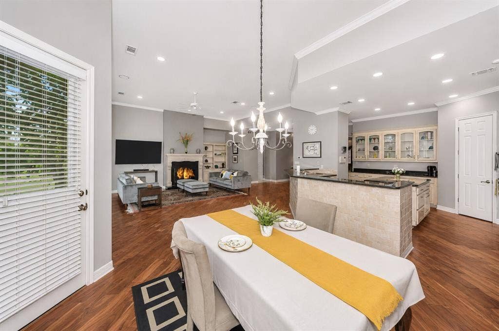 5974 River Bend Drive, Benbrook, TX 76132 Dining area by the kitchen enjoy breakfast with gorgeous views of the water.