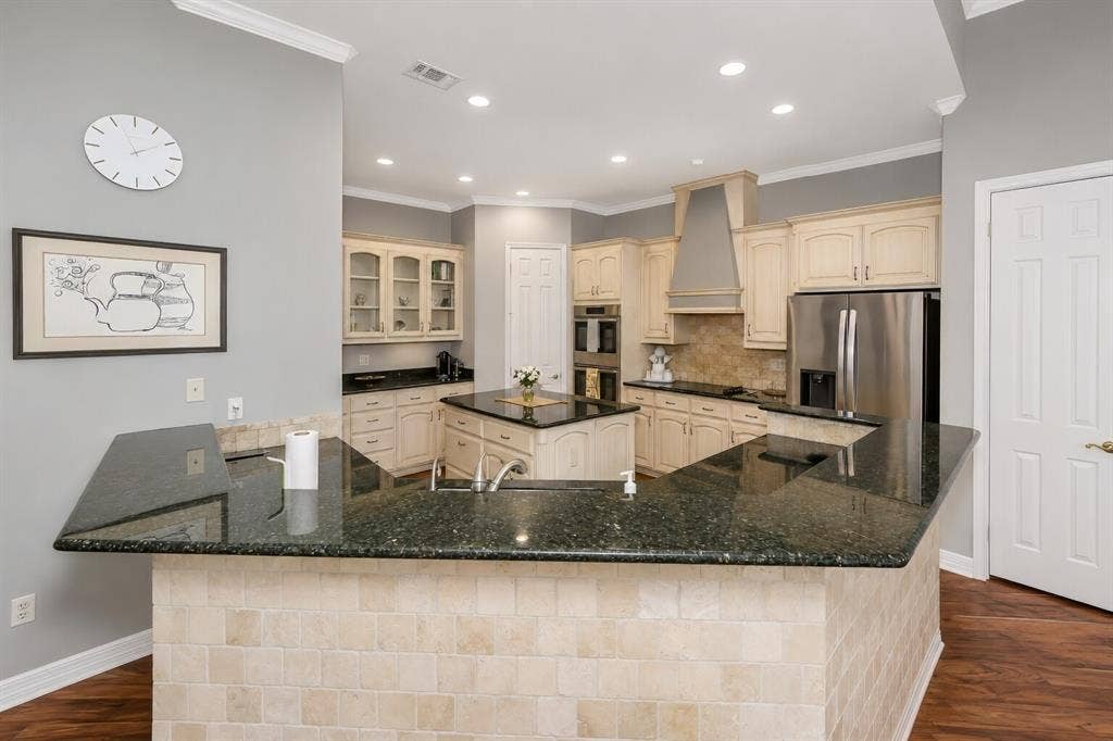 5974 River Bend Drive, Benbrook, TX 76132 Walk in pantry has electrical outlet to keep MCW etc. for clutter free counter tops.
