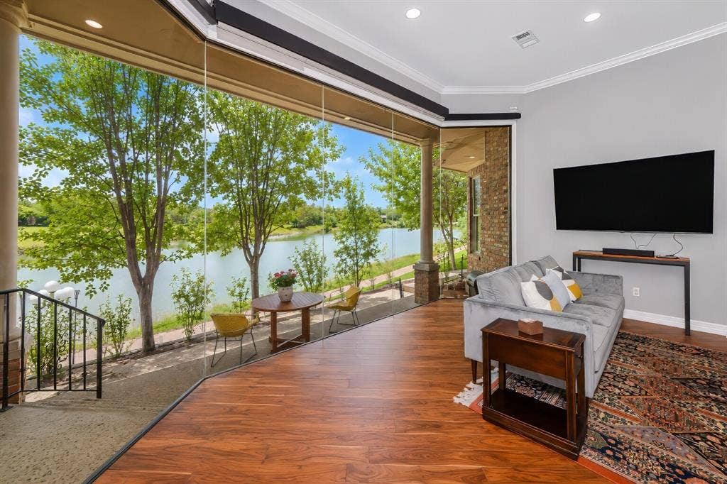 5974 River Bend Drive, Benbrook, TX 76132 Additional view from kitchen and great room . Glass windows have electric shades!
