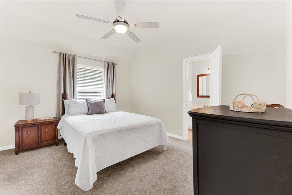 3708 Stockport Drive, Plano, TX 75025 A wide, bright window serves as a beautiful focal point, bathing the entire room in calming natural light. Imagine winding down after a busy afternoon, enjoying the quiet comfort of a space designed for relaxation.