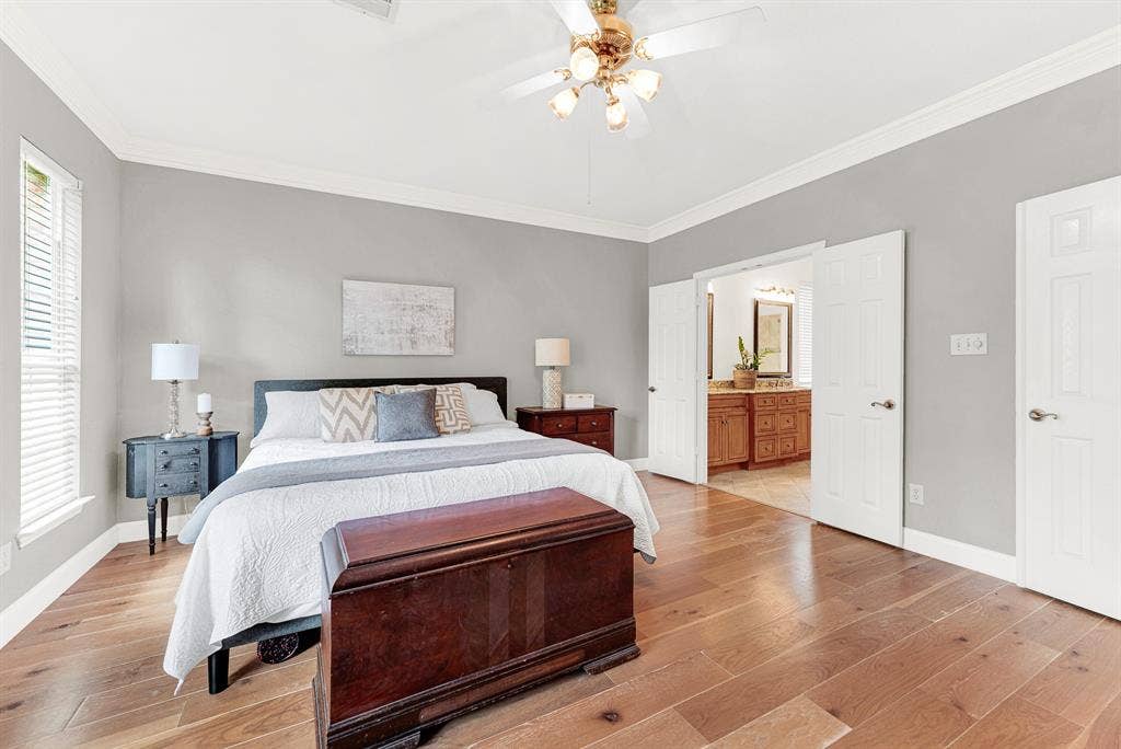 3708 Stockport Drive, Plano, TX 75025 A wide doorway offers a seamless transition into the adjacent bath area. You can easily glance into your bright morning haven right from the bedroom.
