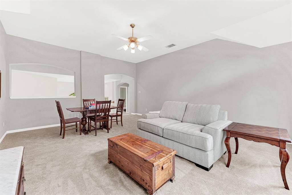 3708 Stockport Drive, Plano, TX 75025 Arched pass-through cutouts connect the expansive room to the rest of the upper level, maintaining a bright and airy flow. Host effortless movie nights or weekend gatherings where everyone feels connected across the open layout.