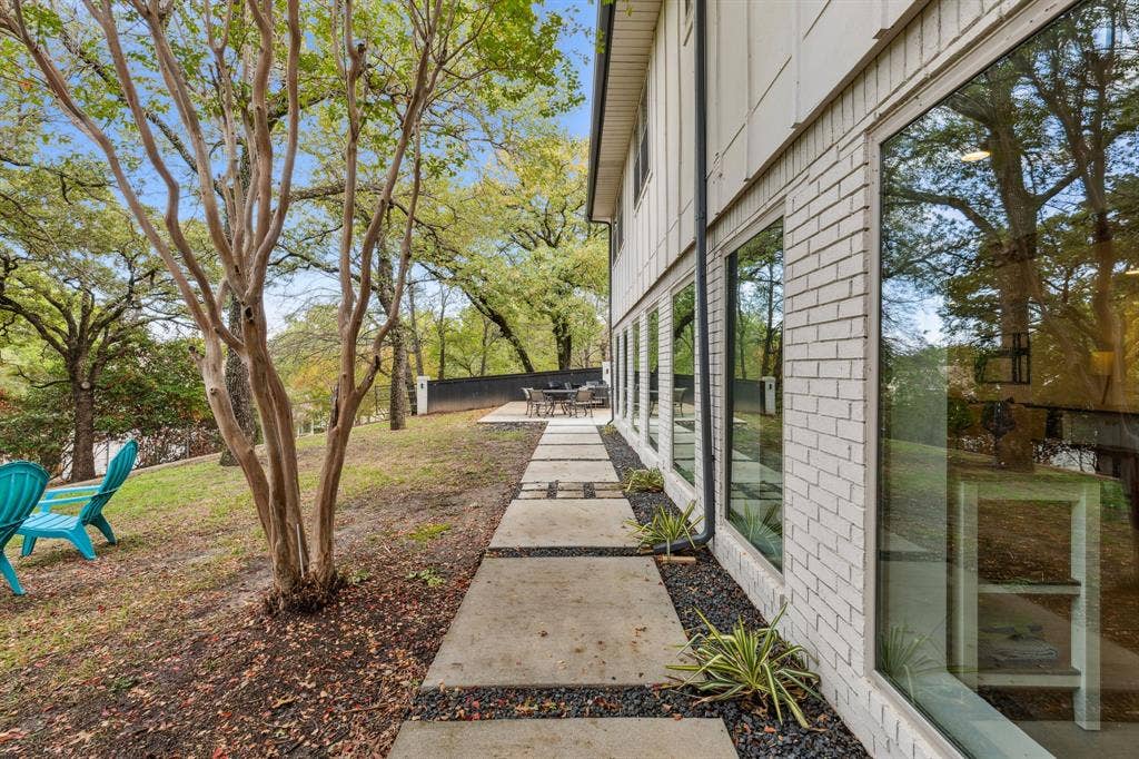 7342 Briar Road, Azle, TX 76020 Hardscaped walkway connects downstairs outdoor living areas