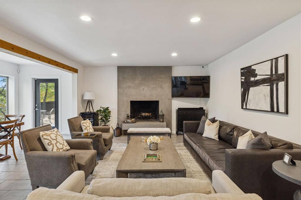 7342 Briar Road, Azle, TX 76020 Tiled living room with a large wood-burning fireplace
