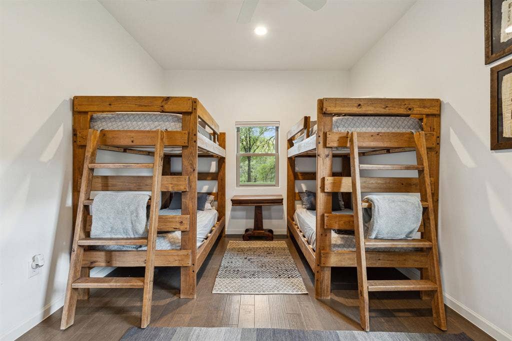 7342 Briar Road, Azle, TX 76020 Bunk-room with tall ceilings and a custom walk-in closet