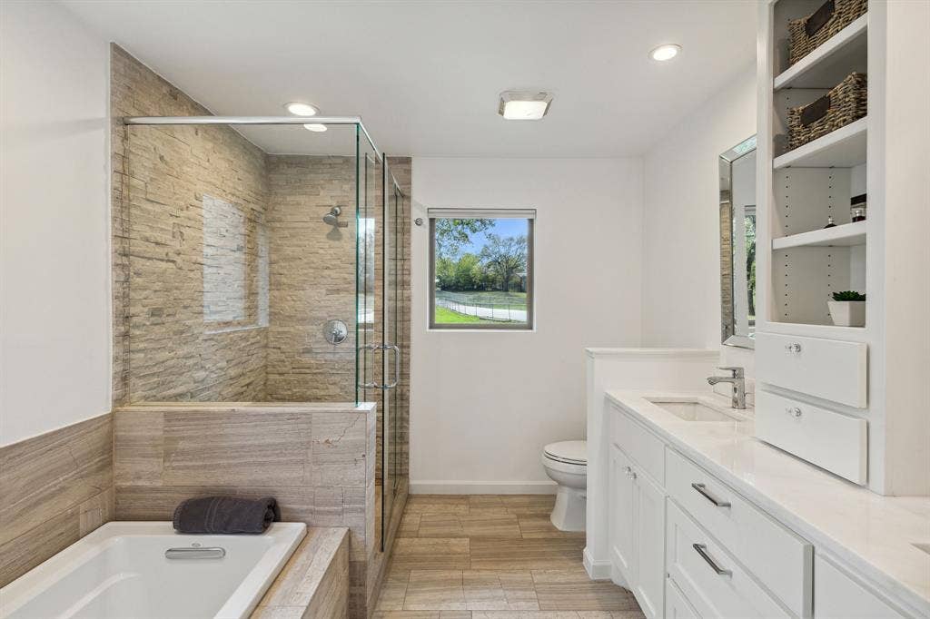 7342 Briar Road, Azle, TX 76020 Full bathroom featuring double vanity, independent shower and bath, valentina marble floors, marble countertops
