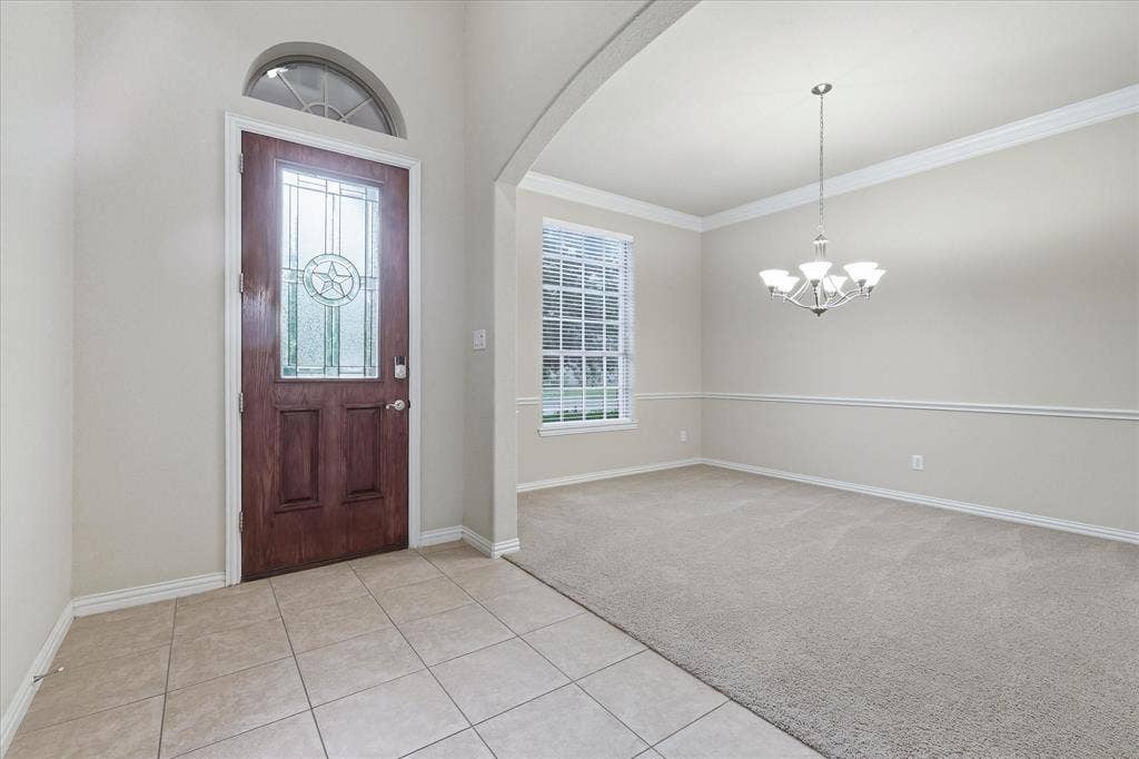 1905 Fountain Meadows Drive, Euless, TX 76039 Entryway opens to the formal dining area. This space could easily serve as an office.
