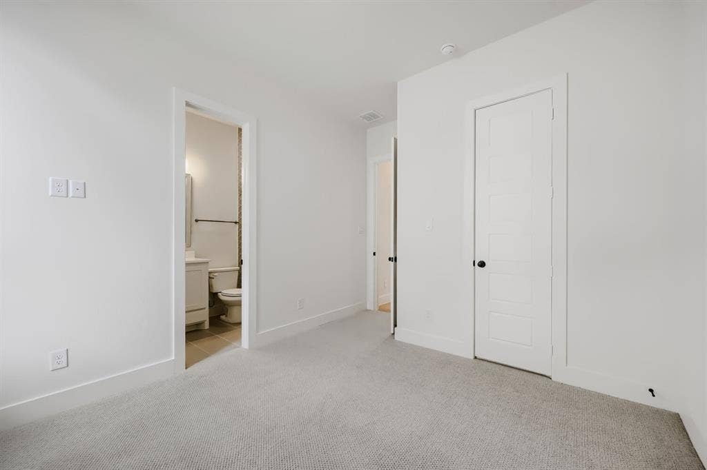 1317 Naples Court, Keller, TX 76248 Light gray carpeting, white walls, and white trim throughout