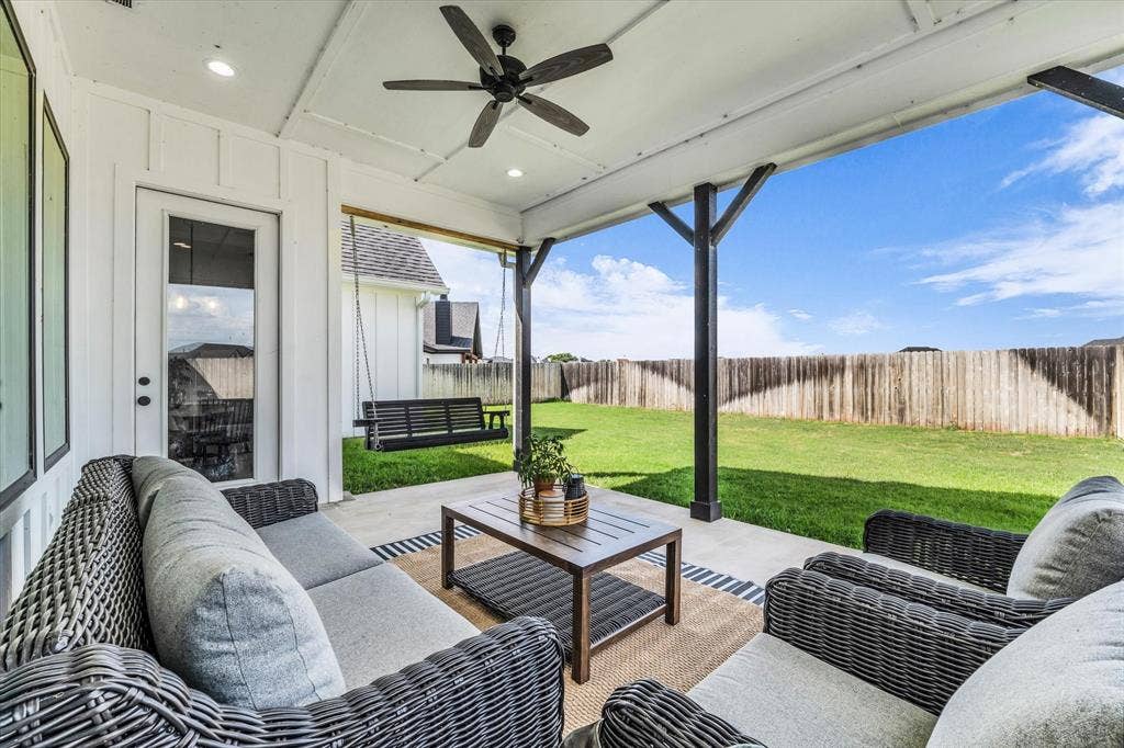 154 Water View Lane, Robinson, TX 76706 large covered back porch with swing; perfect for entertaining guests or relaxing while enjoying the view of the backyard