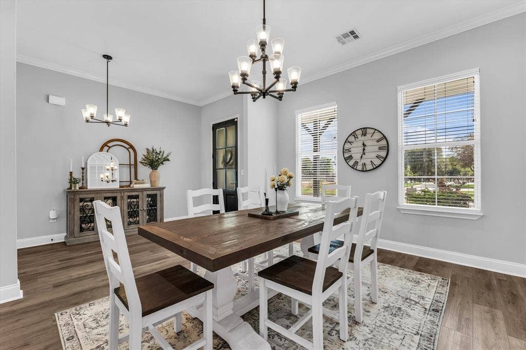 154 Water View Lane, Robinson, TX 76706 dining room with large windows and open layout to entry way