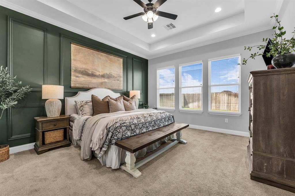 154 Water View Lane, Robinson, TX 76706 isolated primary bedroom with accent wall; wake up to a serene view