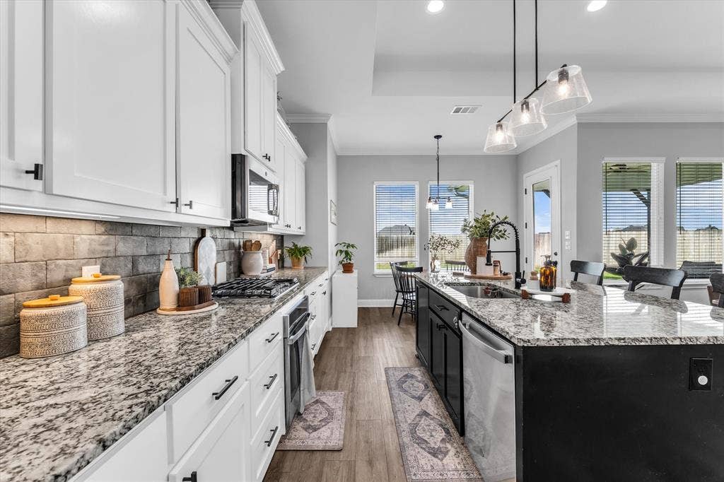 154 Water View Lane, Robinson, TX 76706 large island with sink and plenty of countertop workspace to host and entertain