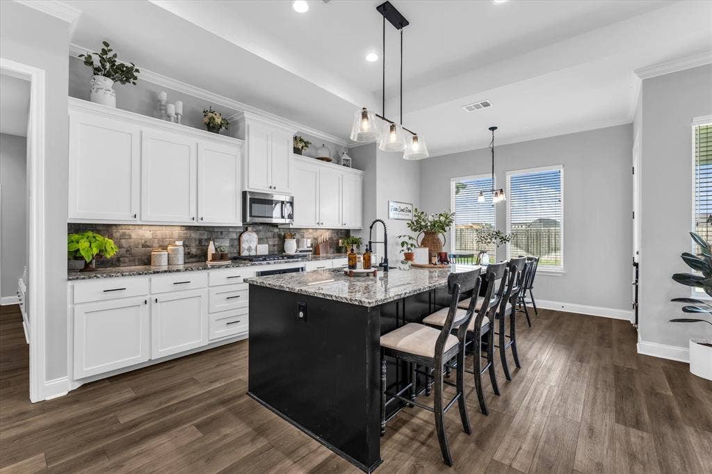 154 Water View Lane, Robinson, TX 76706 endless storage in the large chef's kitchen and plenty of workspace for helpers in the kitchen