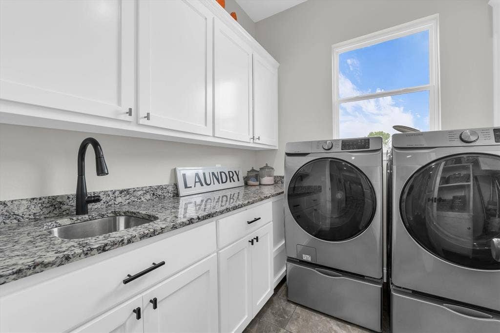 154 Water View Lane, Robinson, TX 76706 sink and ample storage in separate laundry room