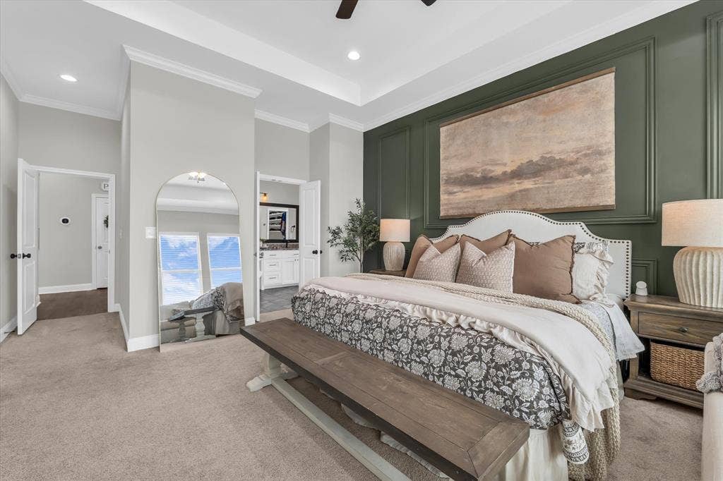 154 Water View Lane, Robinson, TX 76706 isolated primary bedroom with accent wall and ensuite bathroom