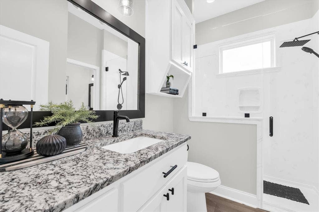 154 Water View Lane, Robinson, TX 76706 shared secondary bathroom with tiled shower