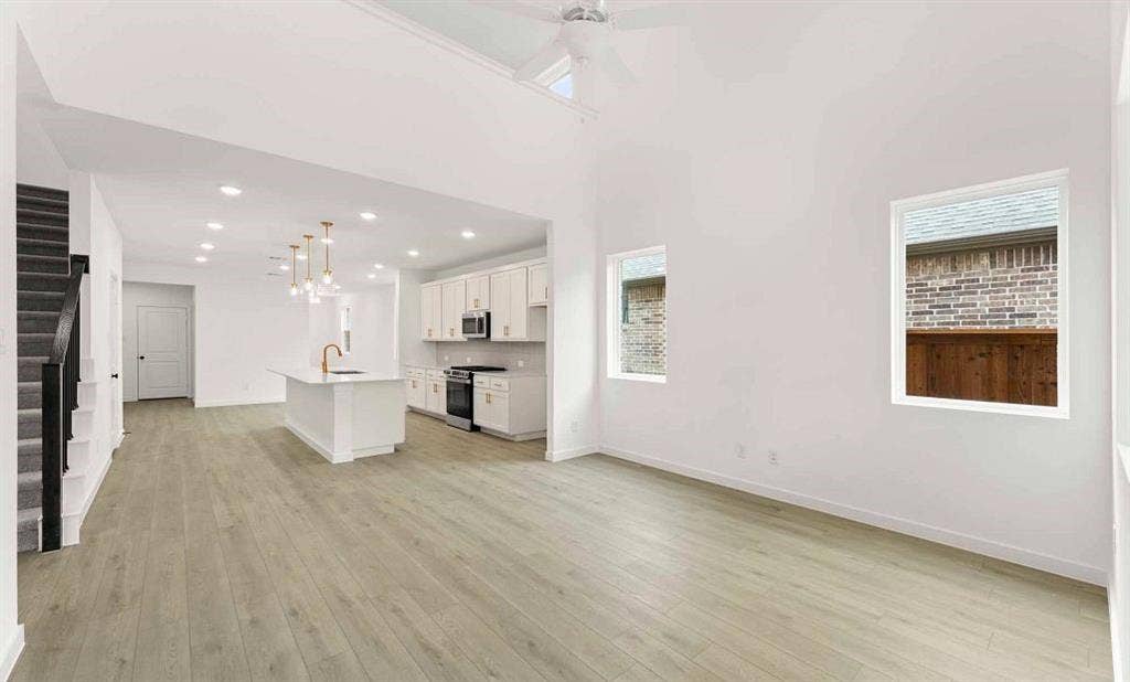3655 Castle Drive, Celina, TX 75009 Open Kitchen-Living Room Representative Photo
