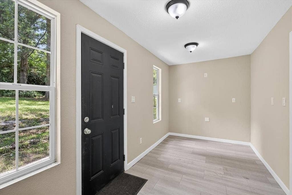 7540 Buggy Hub Trail, Athens, TX 75751 flex room with lots of natural light, leads to laundry room