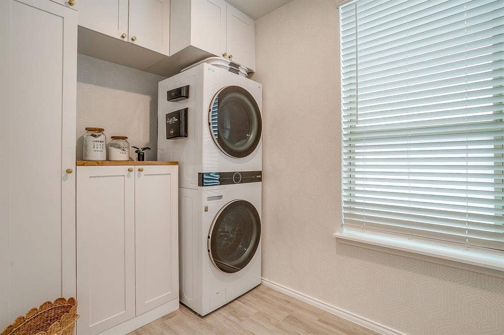 14124 Cassiopeia Drive, Haslet, TX 76052 Spacious utility room with custom built storage.