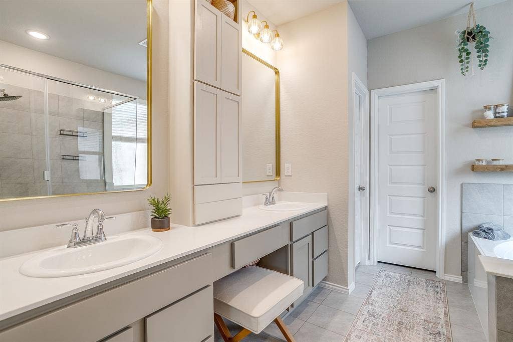 14124 Cassiopeia Drive, Haslet, TX 76052 Custom cabinetry, mirrors, and lighting.