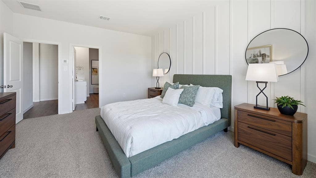 1957 Freeman Street, Tyler, TX 75704 Bedroom featuring a decorative vertical panel accent wall