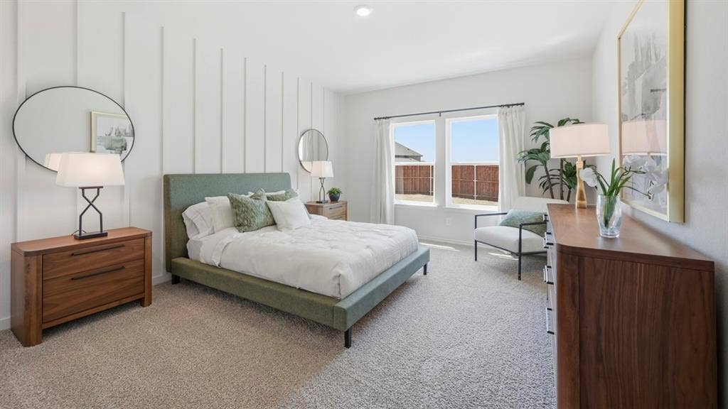 1957 Freeman Street, Tyler, TX 75704 Spacious interior featuring neutral carpet flooring and a prominent accent wall with vertical paneling