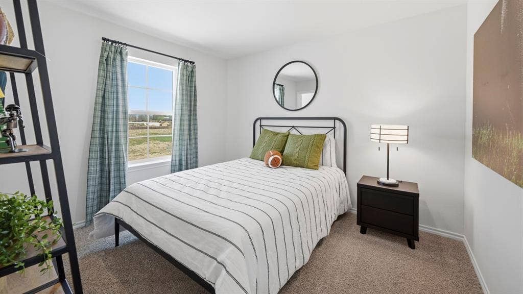 1957 Freeman Street, Tyler, TX 75704 Bedroom featuring a single window, neutral carpeting, and light-toned walls