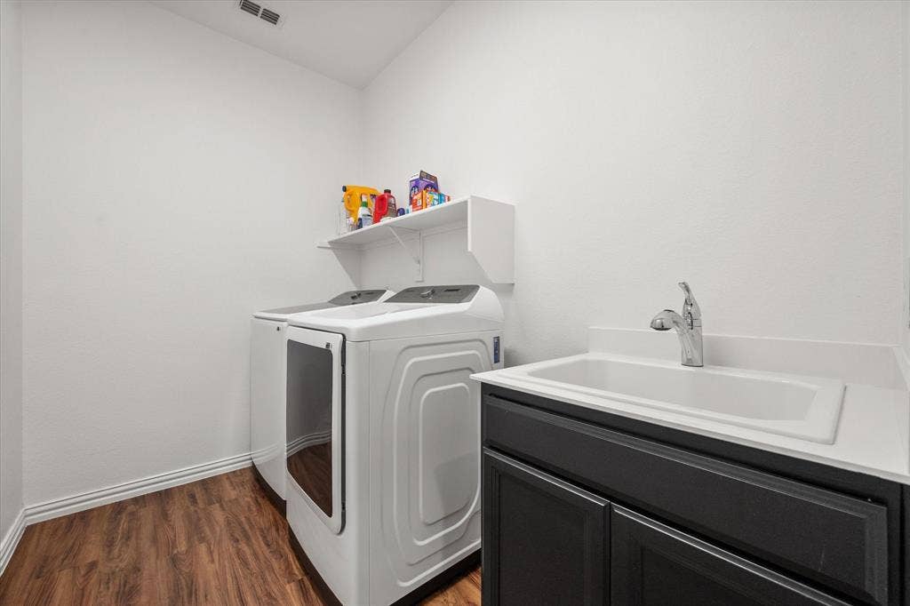 Dedicated laundry room with utility sink