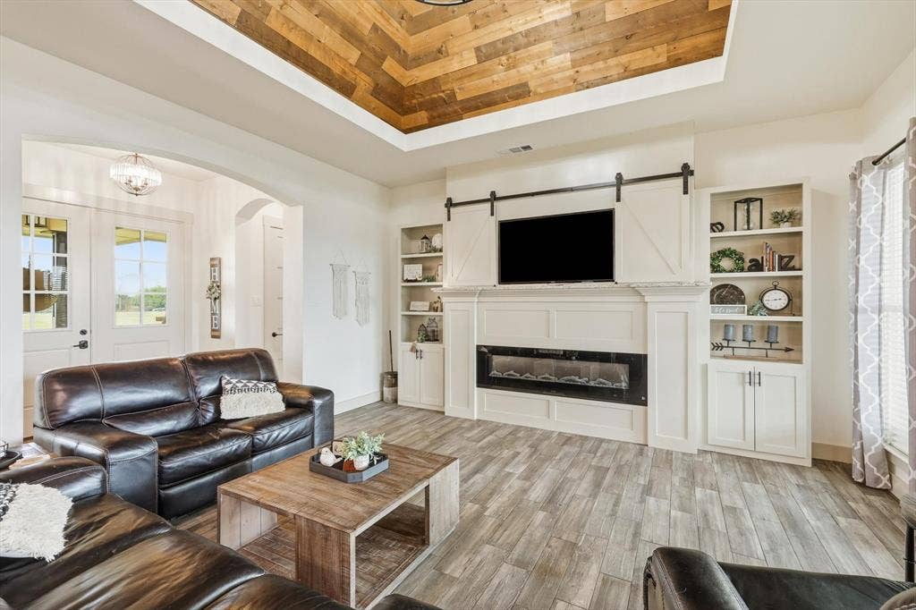 Wood-finish plank flooring throughout