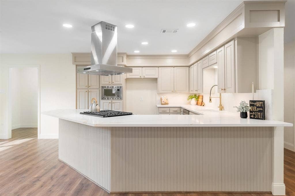 2212 Mountainview Drive, Hurst, TX 76054 New quartz for the spacious countertops, island and backsplash.