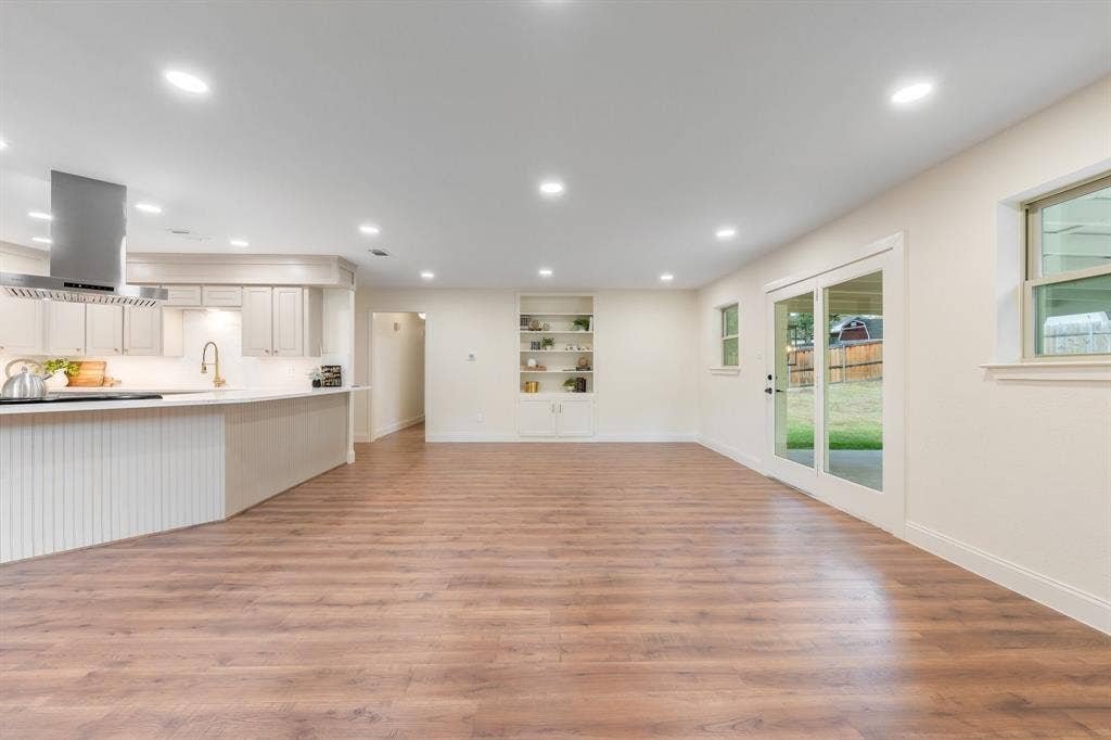 2212 Mountainview Drive, Hurst, TX 76054 Completely remodeled kitchen opens into large living room.