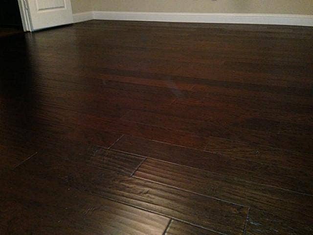 817 Deer Ridge Trail, McKinney, TX 75072 wood fooring in family room, master bedroom and 2nd bedroom on first floor
