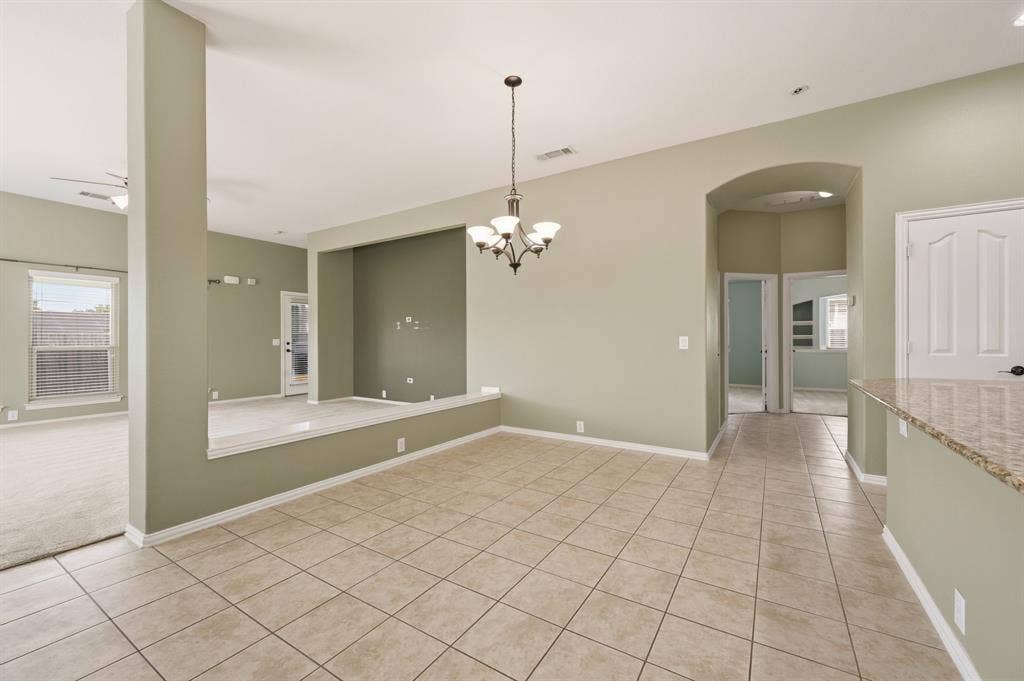 6532 Fairview Drive, Watauga, TX 76148 Open Living Room and Eat-in Kitchen is Perfect for Entertaining and Family Game Night.