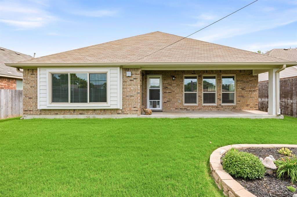 6532 Fairview Drive, Watauga, TX 76148 The Covered Patio in the Backyard is Perfect for Relaxing Year-Round!