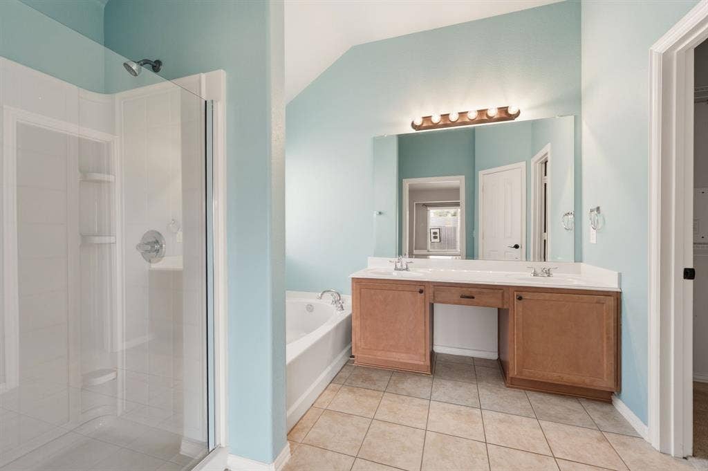 6532 Fairview Drive, Watauga, TX 76148 Master Bath Suite Offers Large Garden Tub and Separate Shower.