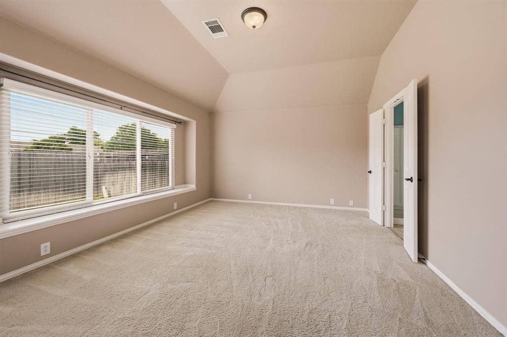 6532 Fairview Drive, Watauga, TX 76148 Primary Bedroom Retreat Featuring Large Windows & Views of the Backyard!