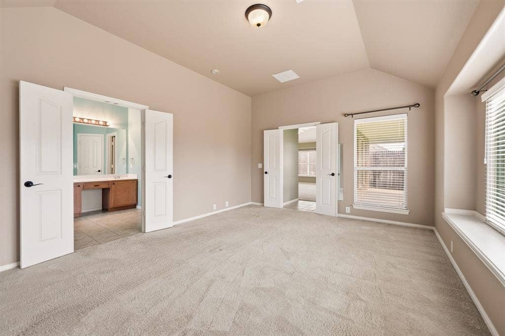 6532 Fairview Drive, Watauga, TX 76148 Another View of the Primary Bedroom with Ensuite Bath.