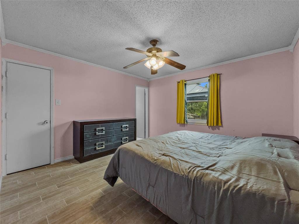 6412 Storm Drive, Watauga, TX 76148 Master bedroom with walk in closet