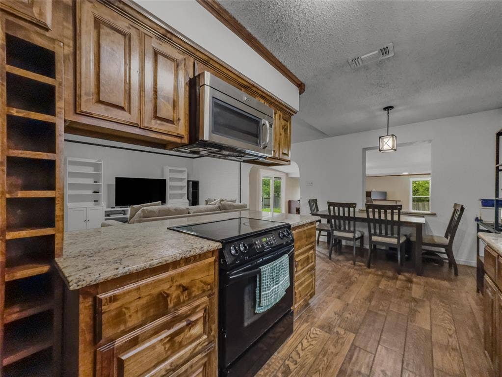 6412 Storm Drive, Watauga, TX 76148 Beautiful granite counters in the kitchen