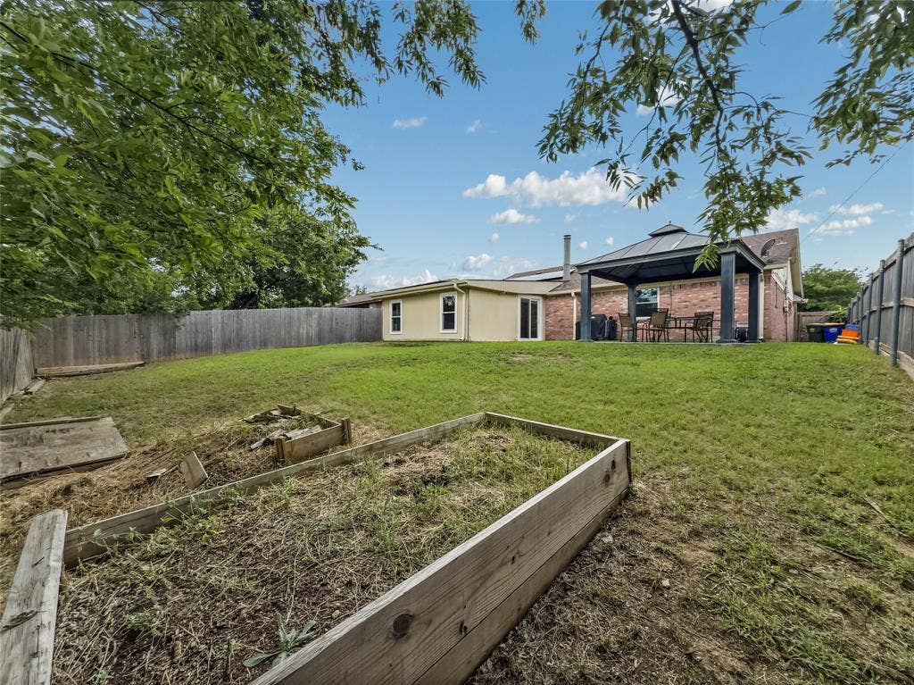 6412 Storm Drive, Watauga, TX 76148 Lots of space in this yard!